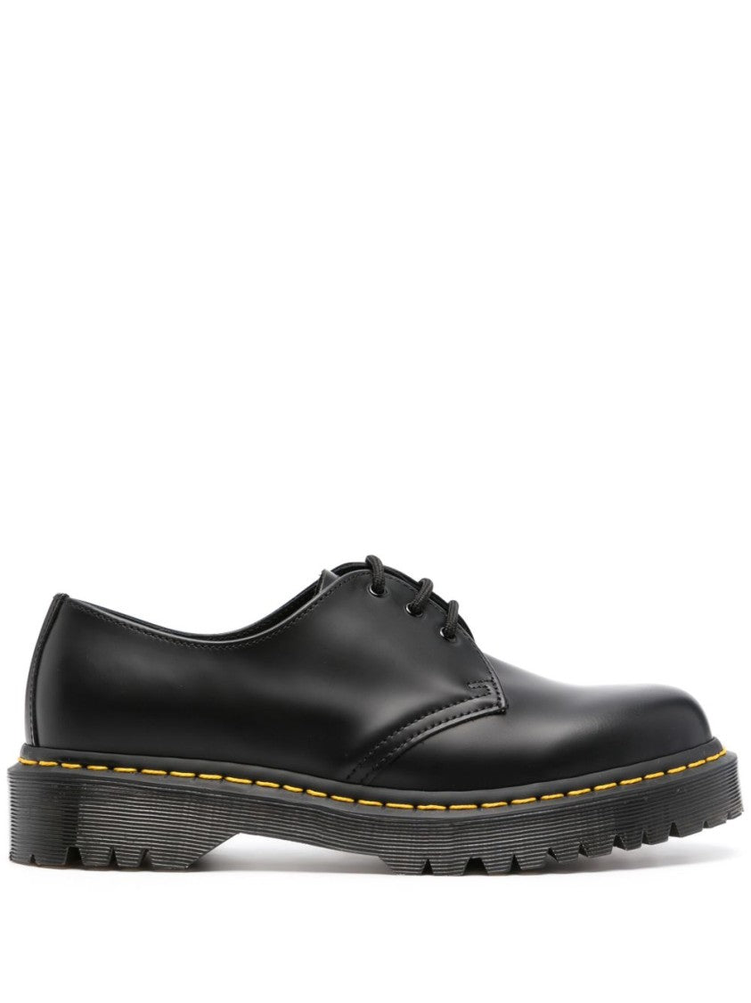 Dr. Martens Polished Black Leather Flats With Chunky Ridged Sole
