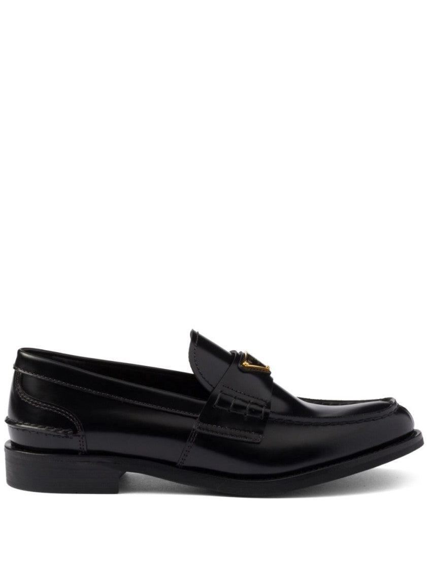 Prada Polished Black Loafers With Decorative Strap