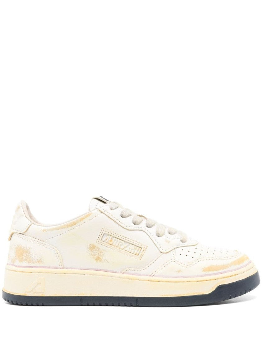 Autry Low-Top Sneakers With Distressed Finish And Perforated Detailing