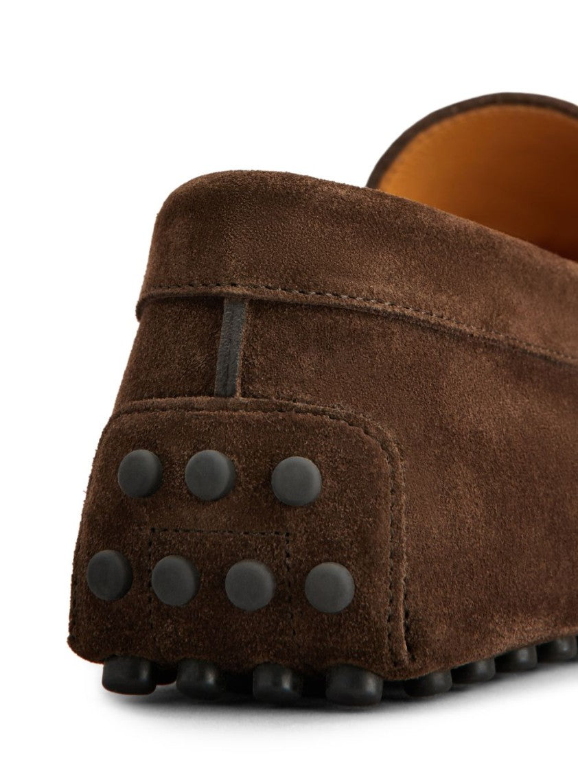 Tod's Moccasin Toe Loafers With Decorative Bow And Rubber Pebble Sole