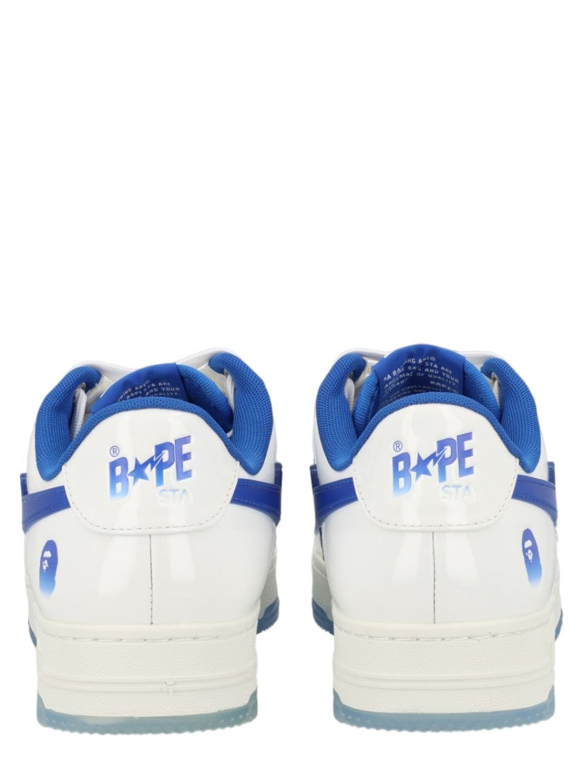 A Bathing Ape Low-Top Sneakers With Vibrant Blue Accents And Metallic Lace Locks