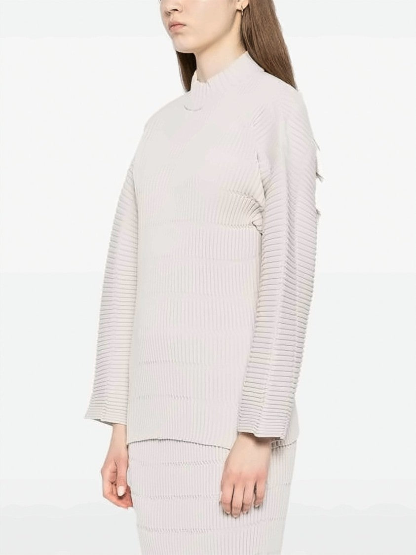 Pleats Please Structured Pleated Turtleneck With Textured Ribbed Design
