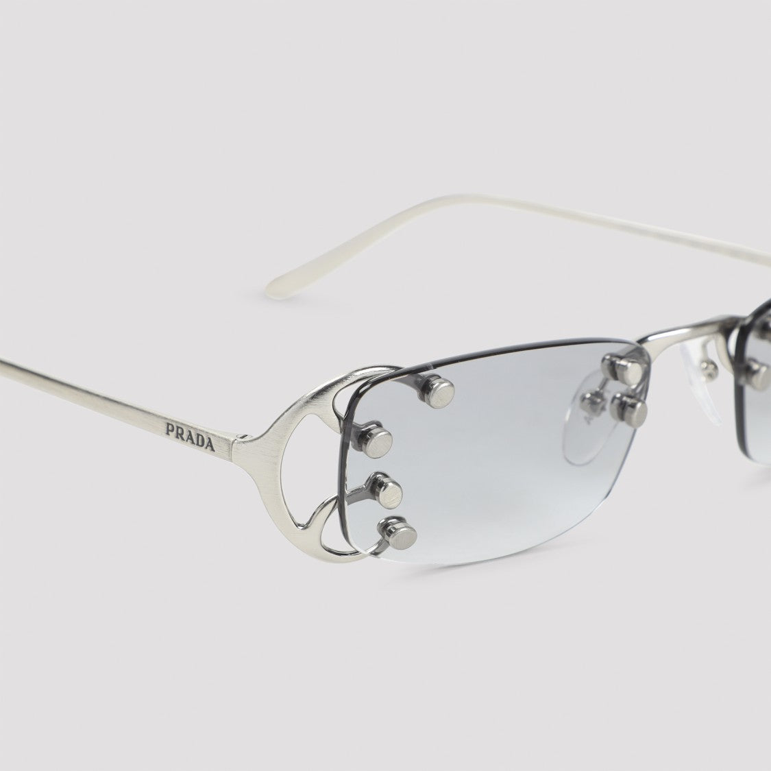 Prada Rimless Rectangular Sunglasses With Polished Metal Frames