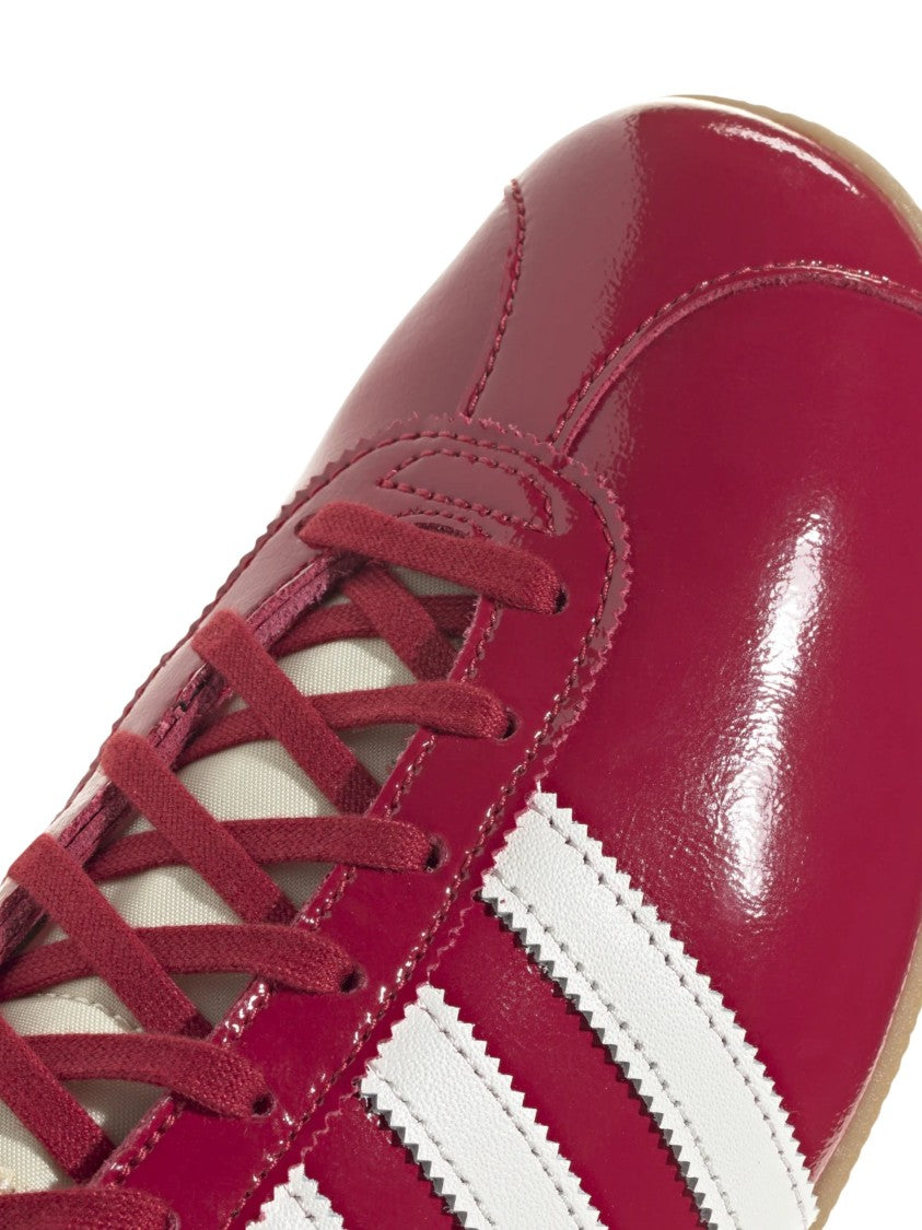 Adidas Glossy Red Sneakers With Contrasting Details