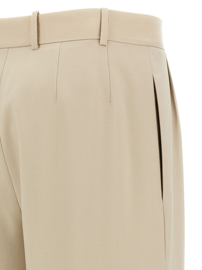 Saint Laurent Wide Leg Wool Trousers With Silk Lining And Stretched Pleats
