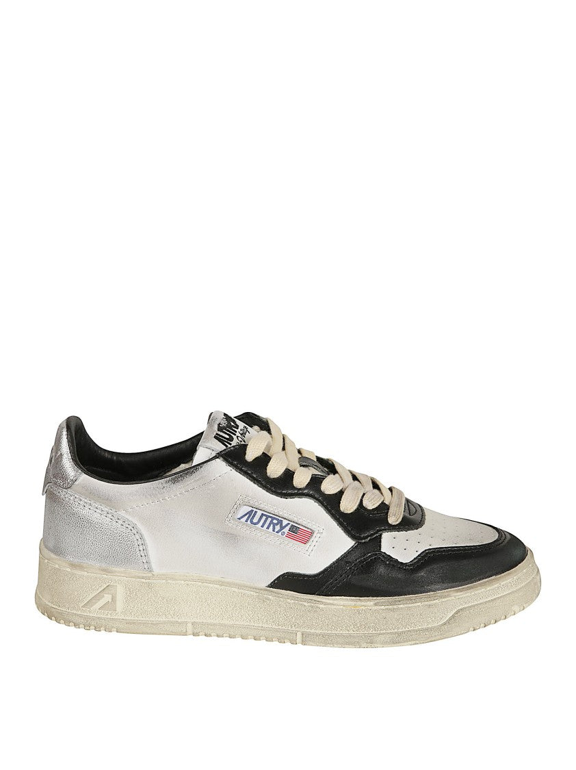 Autry Low-Top Sneakers In Crackled Leather With Handcrafted Worn Effect