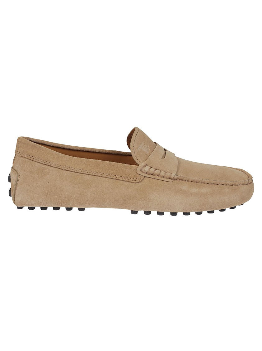 Tod's Moccasin-Inspired Leather Loafers With Rubber Pebble Sole