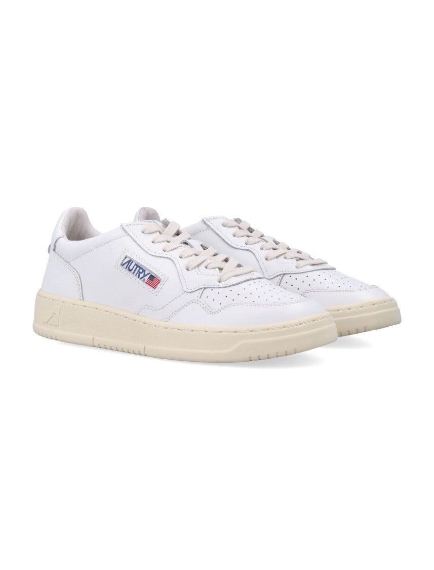 Autry Minimalist Low-Cut Sneakers With Perforated Design