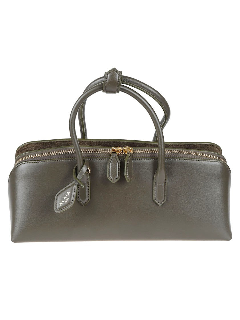 Alaïa Elongated Handbag With Structured Silhouette And Gold-Zip Closure