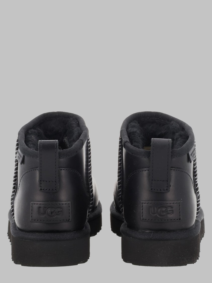 Ugg Matte Black Flats With Rounded Toe And Subtle Stitching