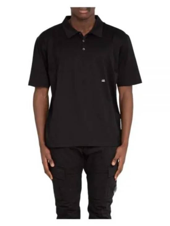 C.P. Company Classic Black Polo Shirt With Collared Neckline And Subtle Logo Detail
