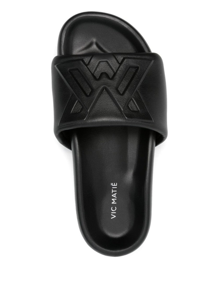 Vic Matié Black Ridged Rubber Sole Embossed Sandals
