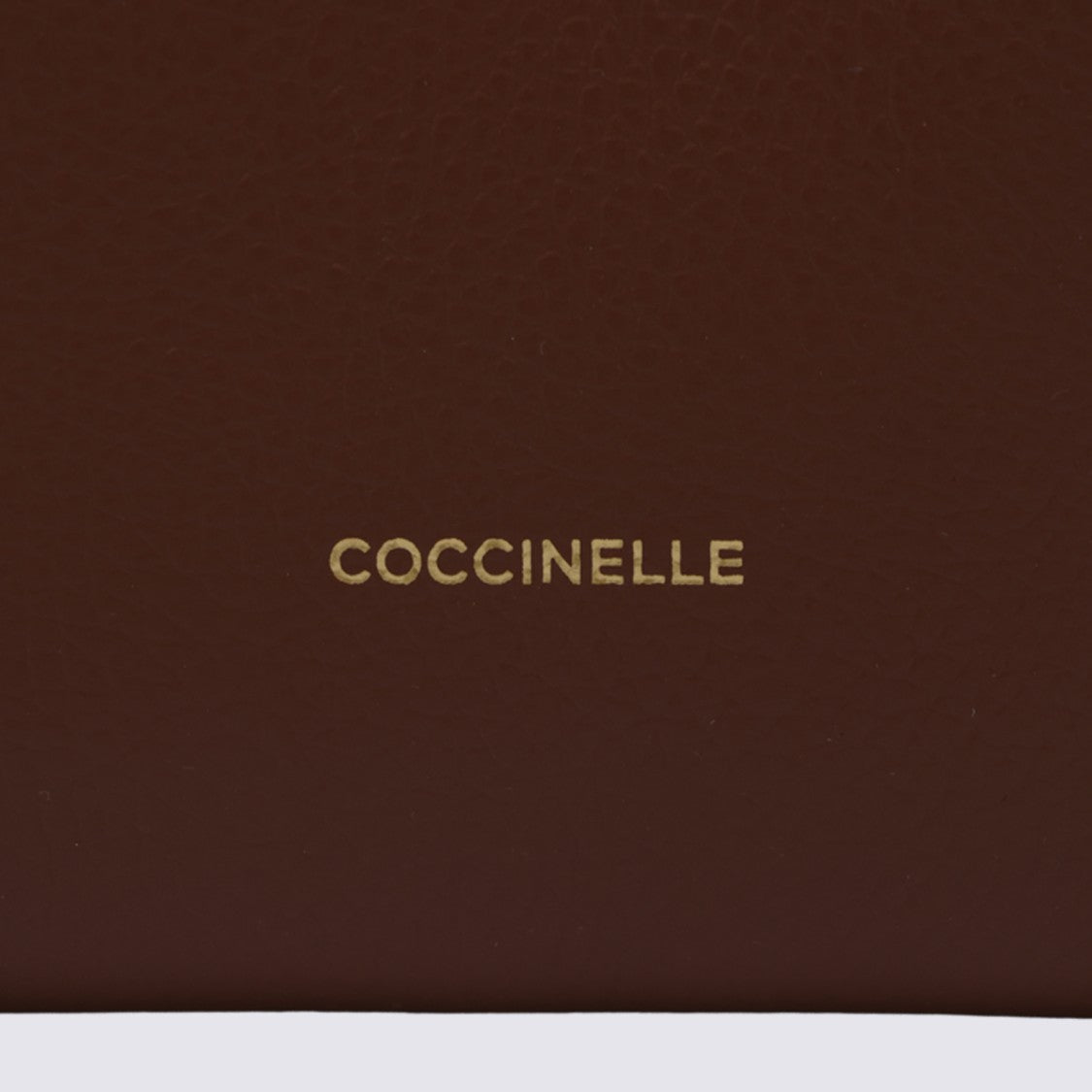 Coccinelle Structured Handbag With Rounded Flap And Braided Handle