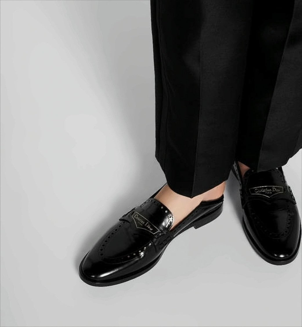Christian Dior Sleek Backless Loafers With Perforated Detailing And Branded Plaque