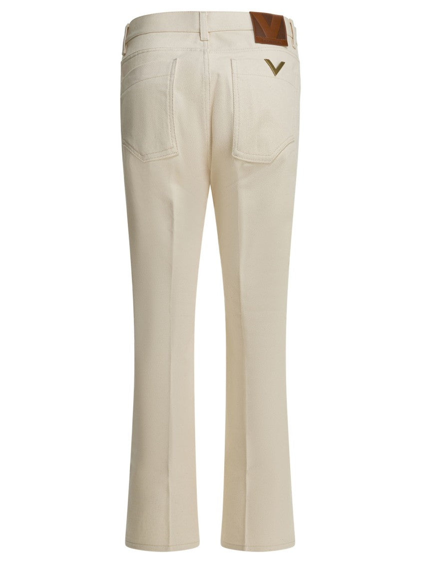 Valentino Straight-Leg Denim Jeans With Subtle Stitching And Leather Patch