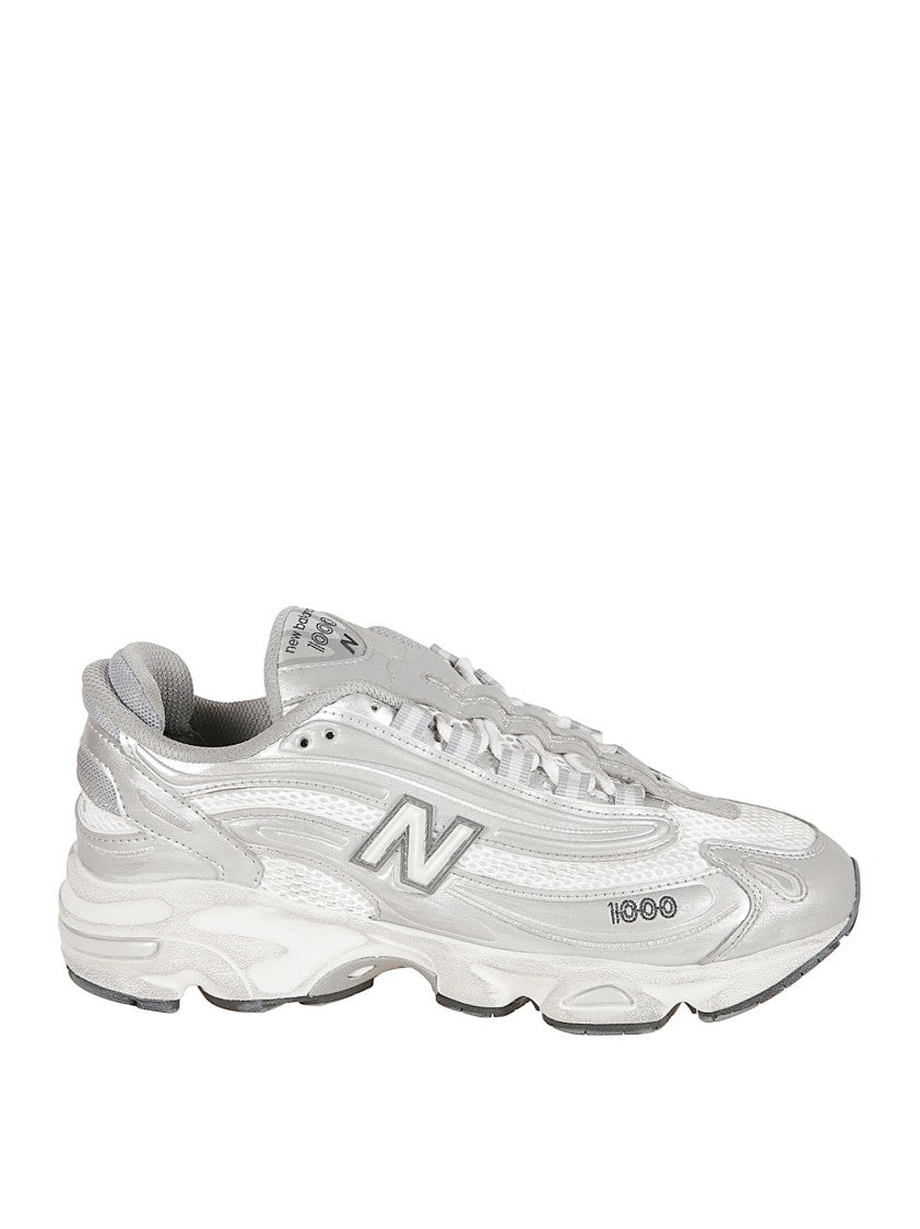 New Balance Streamlined Silver Sneakers With Textured Sole