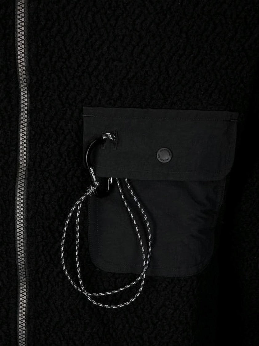 And Wander Textured Black Jacket With High Collar And Unique Pocket Design