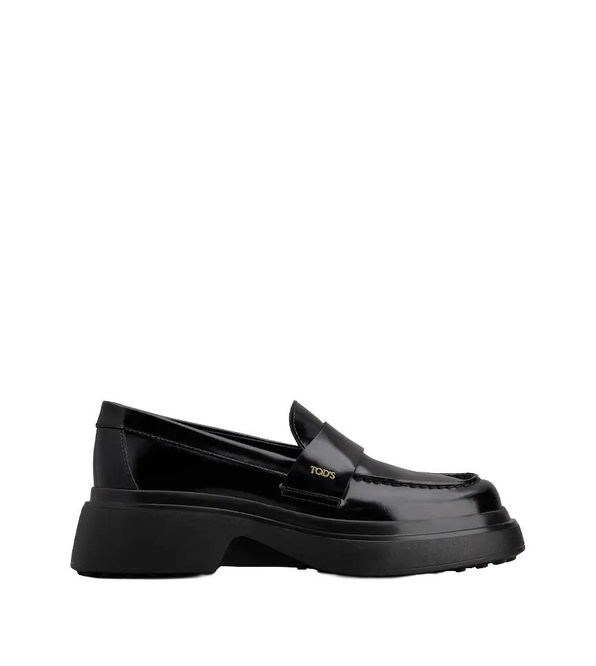 Tod's Timeless Black Calfskin Loafers With Textured Sole
