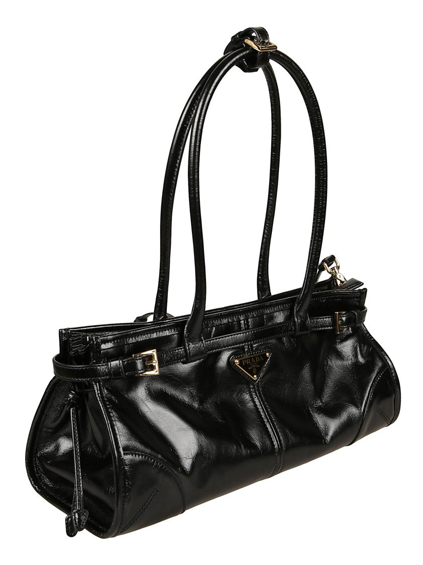 Prada Glossy Black Elongated Handbag With Gold Accents