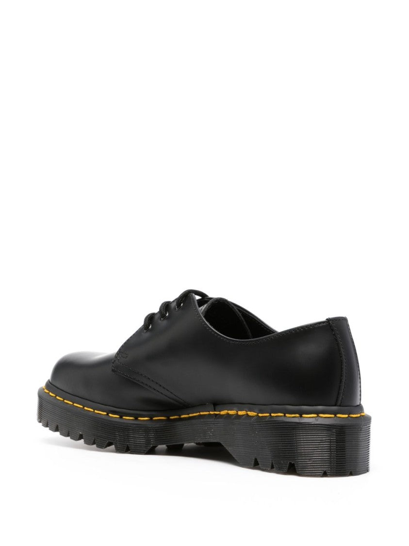 Dr. Martens Polished Black Leather Flats With Chunky Ridged Sole