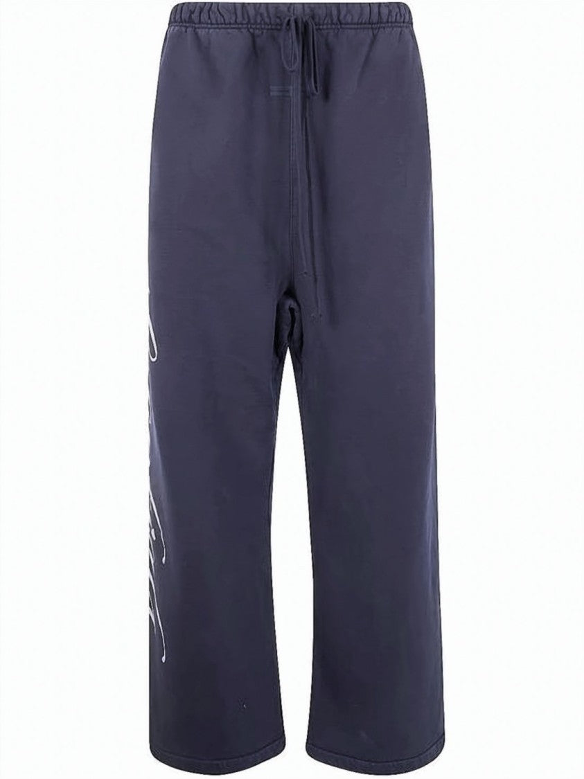 Fear Of God Cropped Blue Cotton Pants With Bold Graphic Print