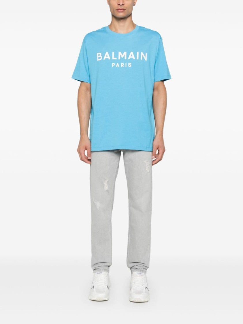 Balmain Light Grey Distressed Denim Trousers