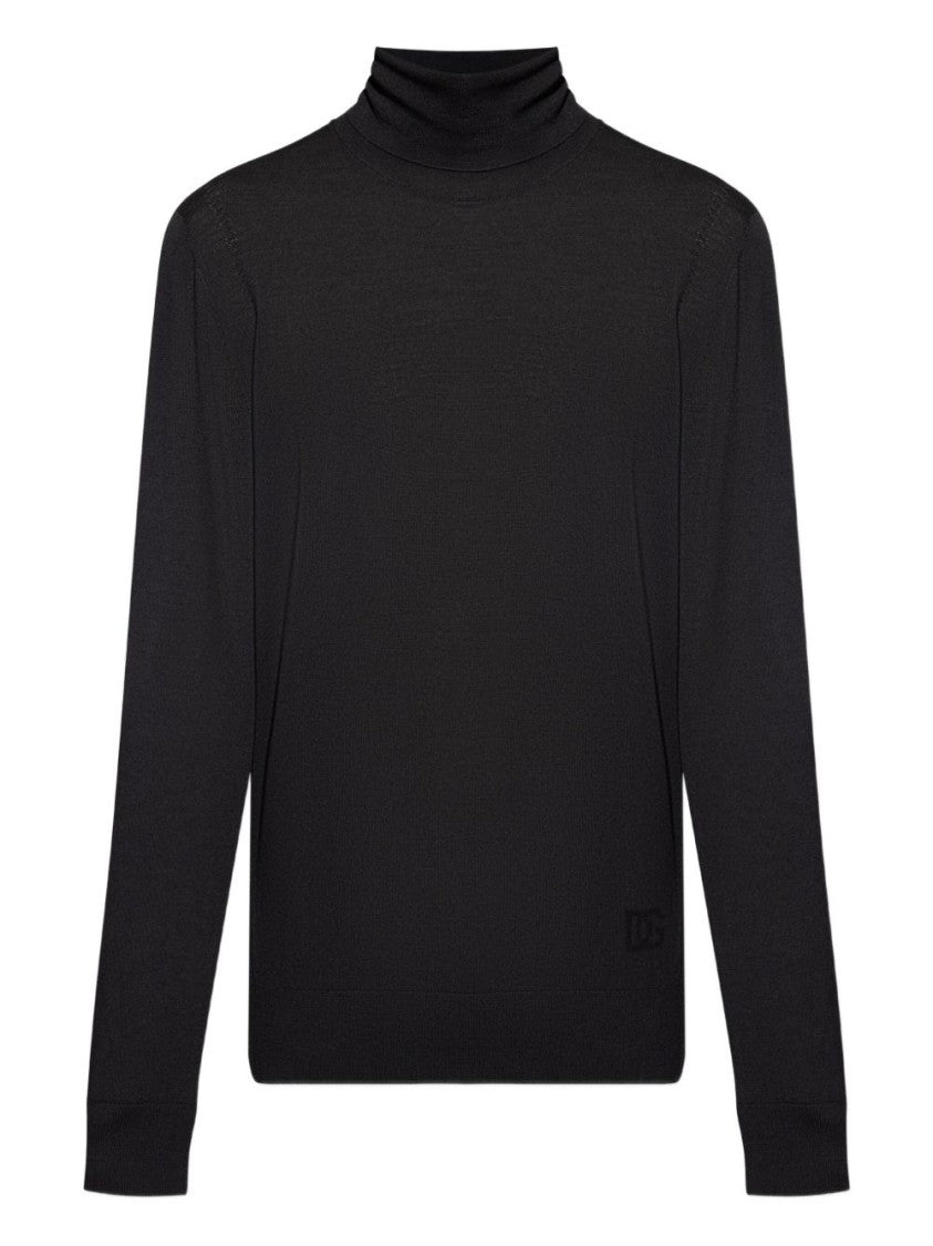 Dolce & Gabbana Fitted Black Turtleneck Sweater With Embossed Detail