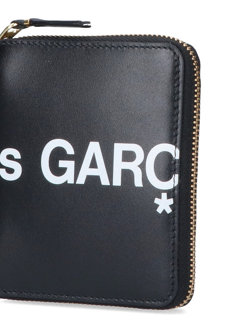 Comme Des Garçons Compact Black Wallet With Zip-Around Closure