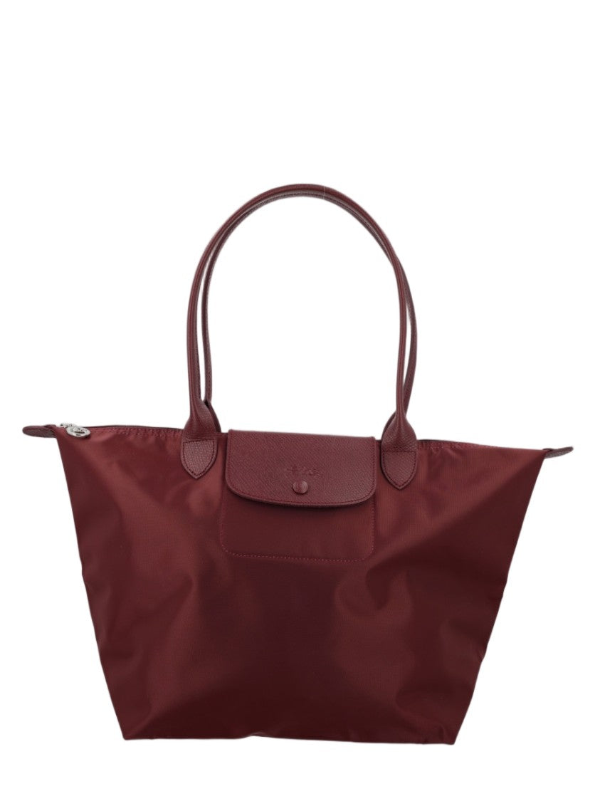 Longchamp Spacious Trapezoidal Tote Bag With Dual Handles And Zippered Closure