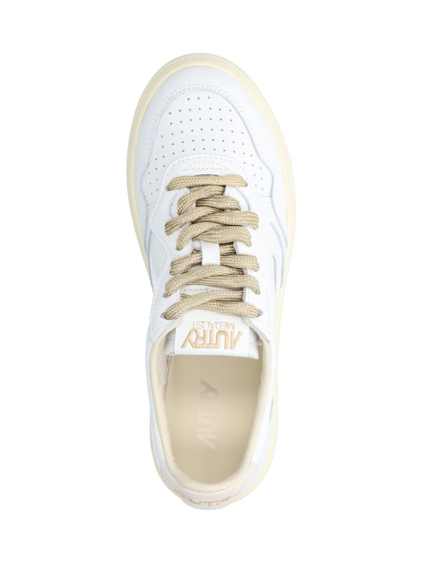 Autry Low-Top Sneakers With Suede Accents And Golden Details