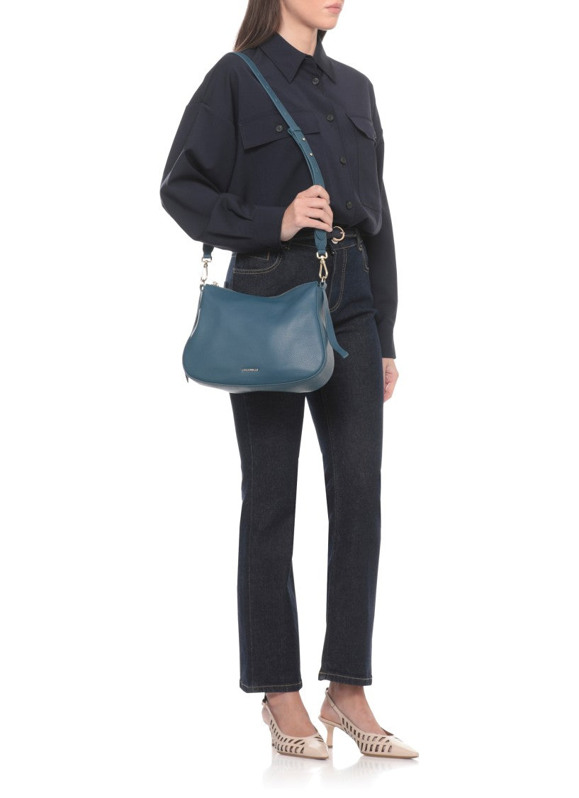 Coccinelle Compact Blue Leather Shoulder Bag With Versatile Strap Options