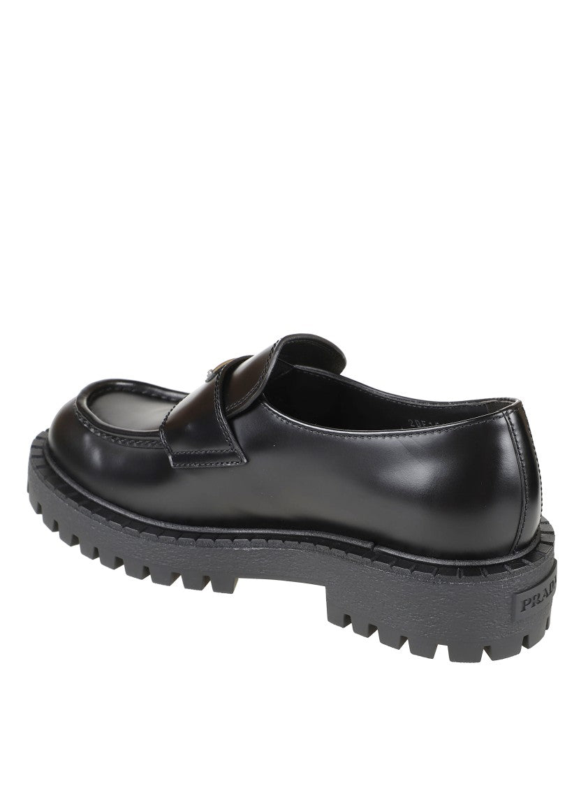 Prada Polished Black Leather Loafers With Chunky Rubber Sole