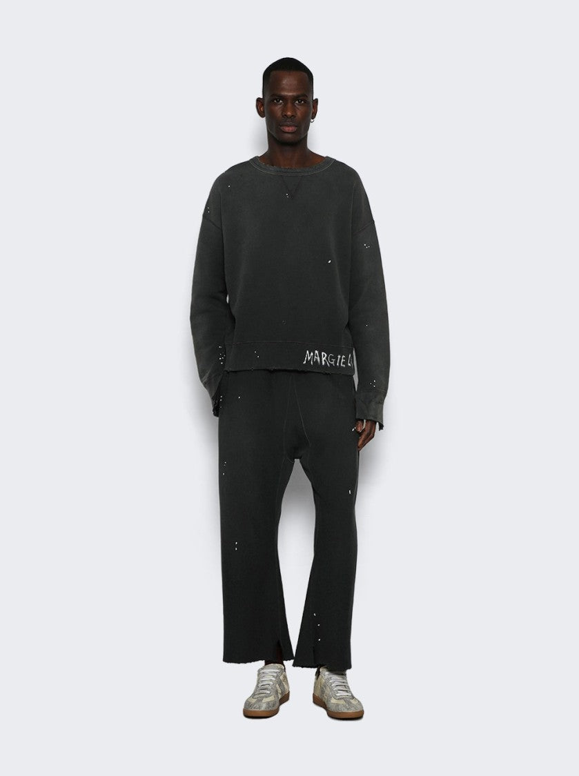Maison Margiela Relaxed-Fit Washed Black Pants With Flared Leg Design