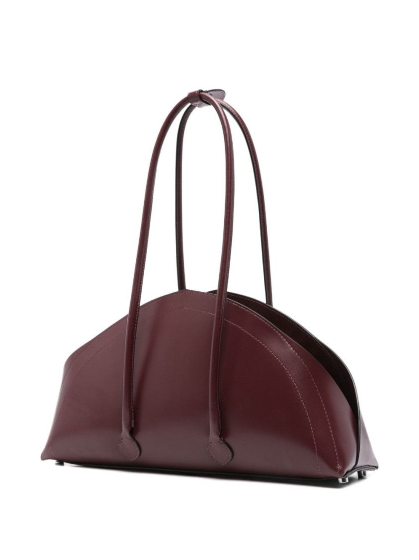 Federico Cina Bordeaux Handbag With Elongated Semi-Circular Silhouette