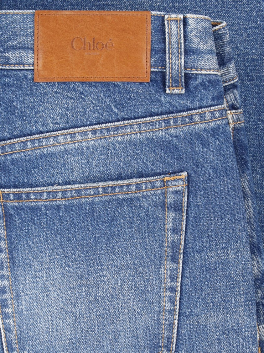 Chloé High-Waisted Wide-Leg Jeans With Frayed Hem And Subtle Whiskering