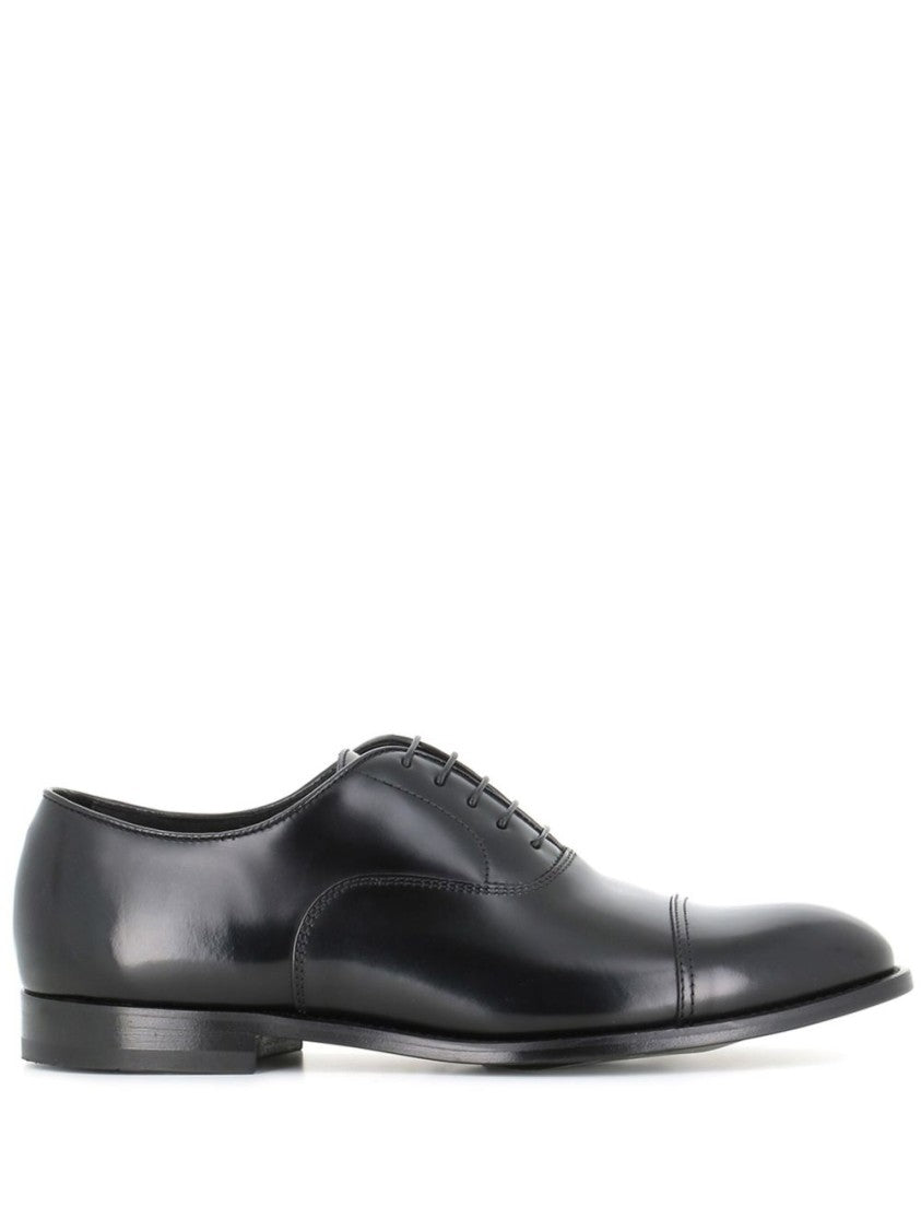 Doucal's Polished Black Oxford Shoes With Subtle Stitching Details