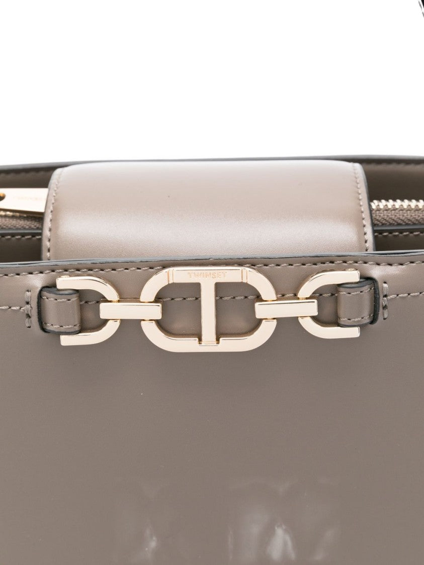Twin-Set Structured Handbag With Metal Clasp And Versatile Carrying Options