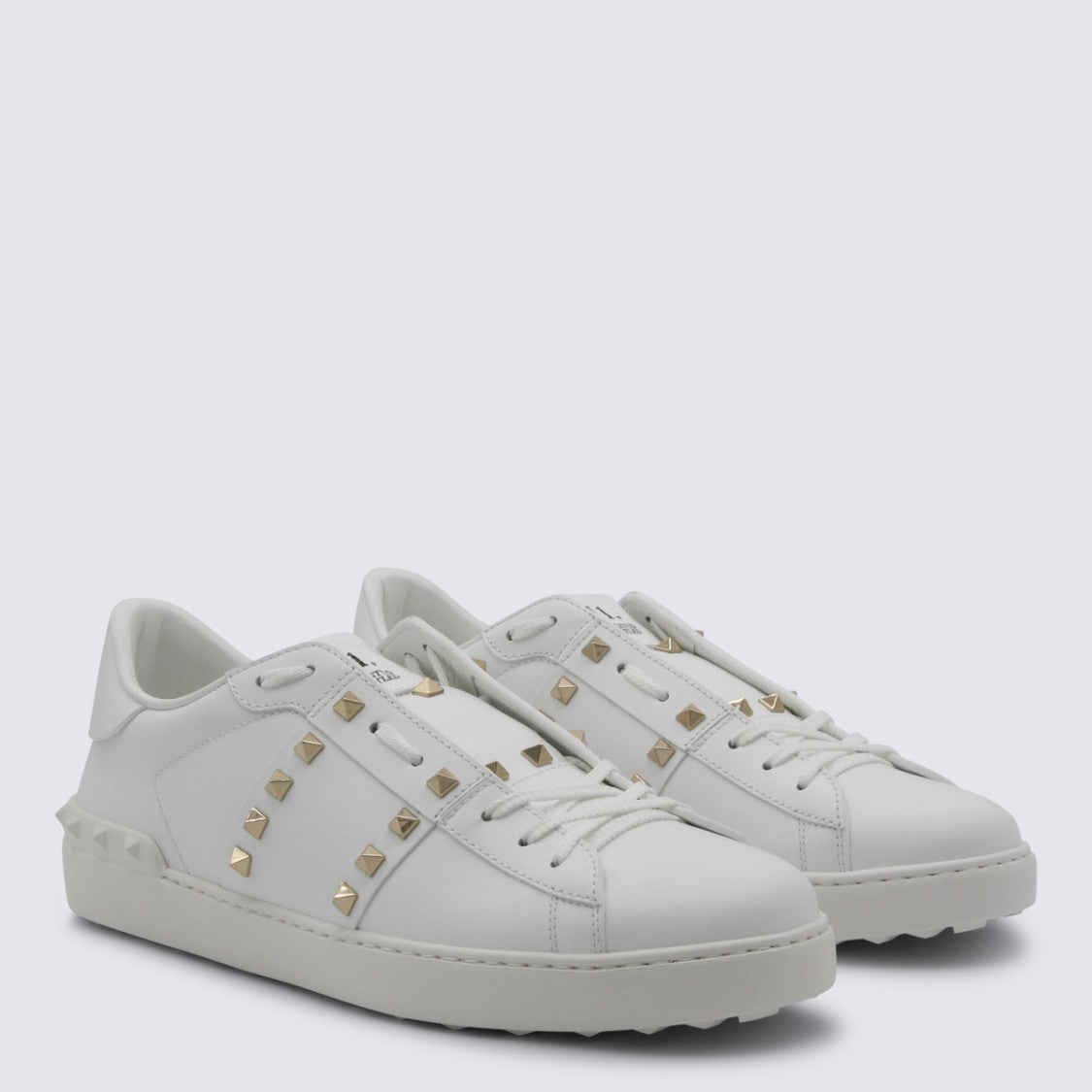 Valentino Garavani Low-Top Sneakers With Gold-Tone Pyramid Studs