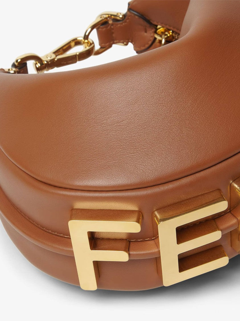 Fendi Crescent-Shaped Leather Handbag With Polished Finish And Bold Letter Embellishments