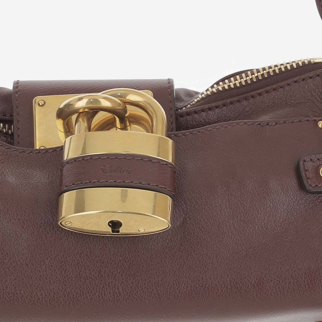 Chloé Cylindrical Dark Brown Leather Handbag With Removable Strap And Padlock Detail