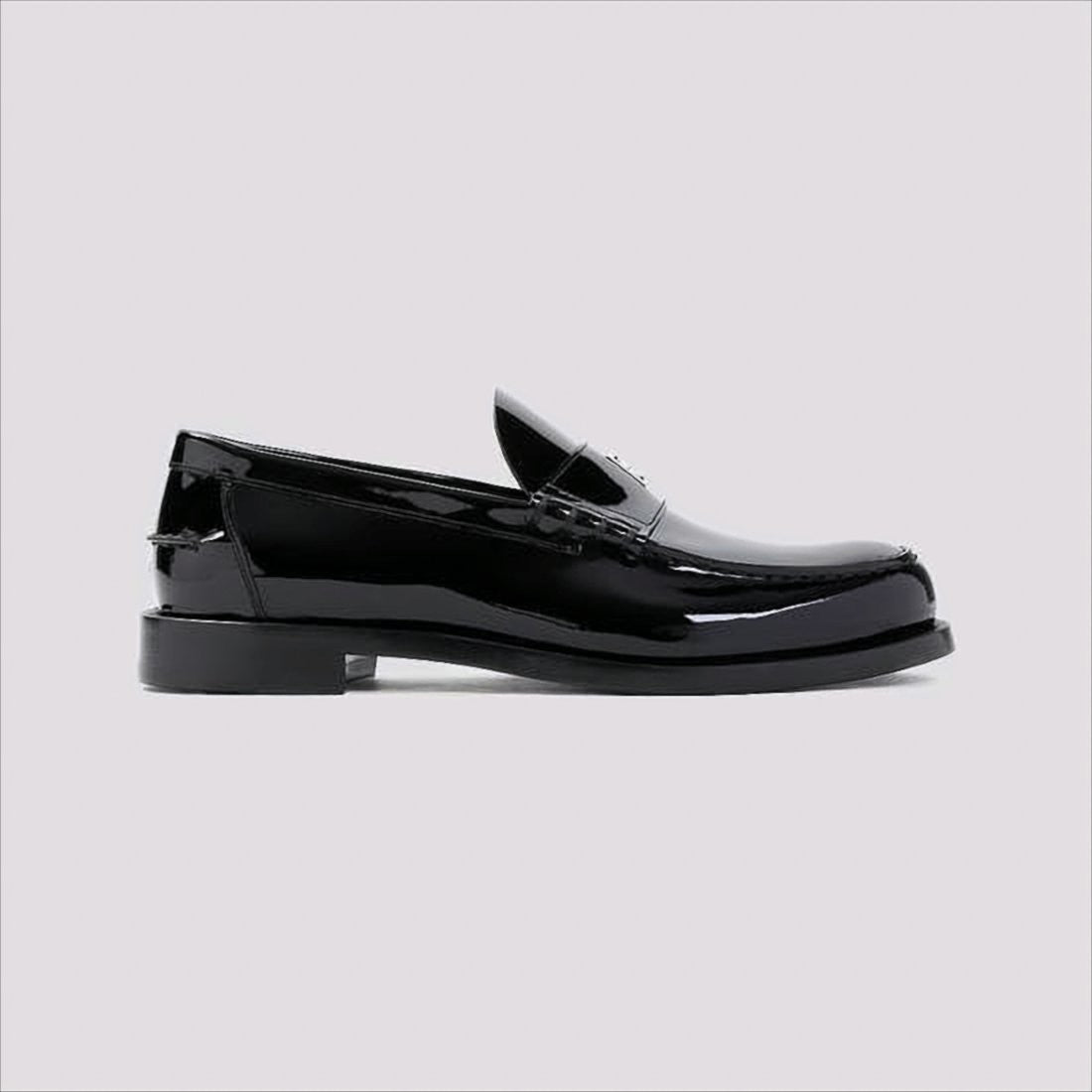 Givenchy Glossy Black Moc Toe Loafers With Metallic Details