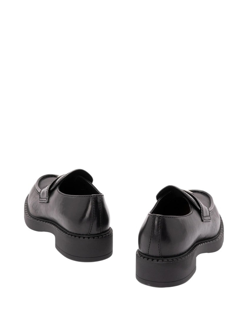 Prada Enamelled Triangle Logo Black Leather Slip-On Shoes