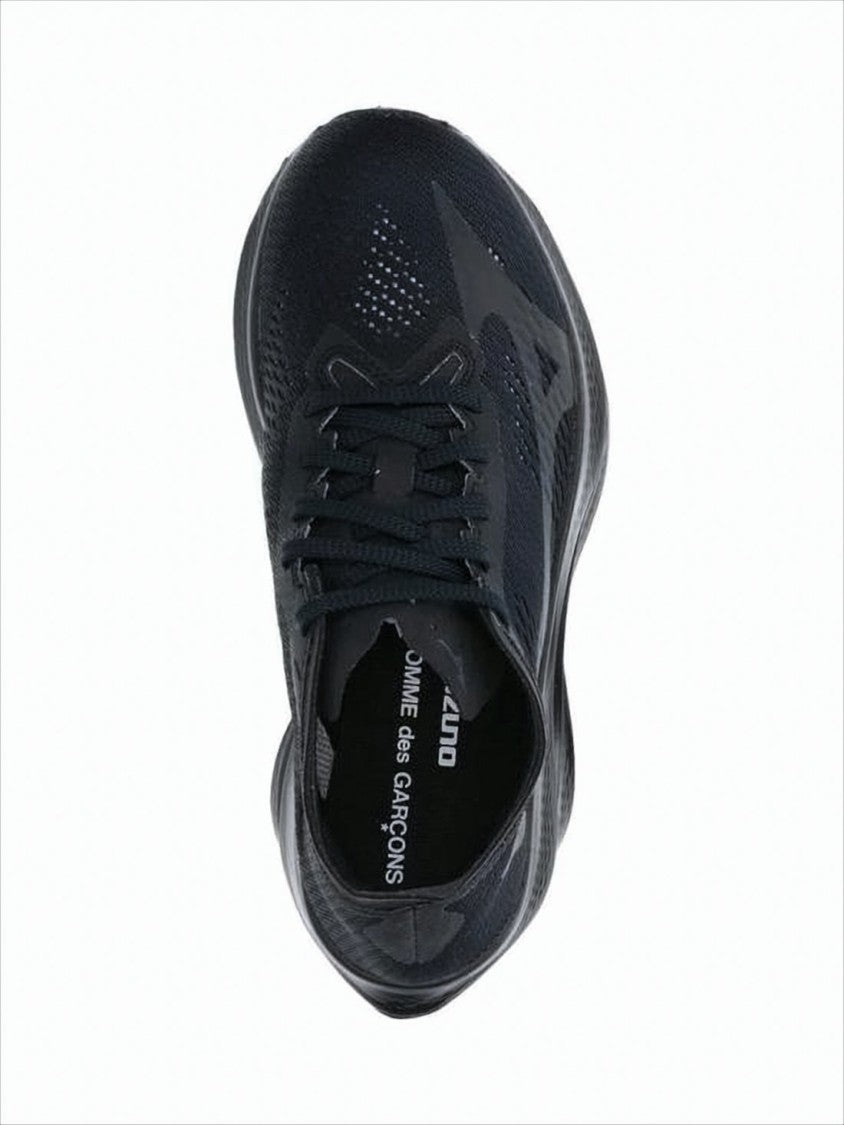 Comme Des Garçons Streamlined All-Black Sneakers With Textured Sole