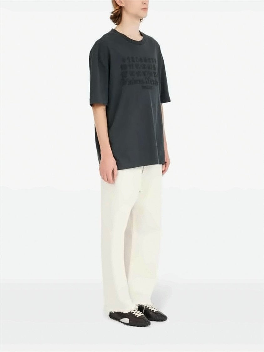 Maison Margiela Minimalist Black Short-Sleeved T-Shirt With Tonal Embossed Design