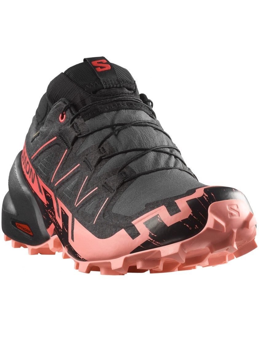 Salomon Streamlined Black Athletic Sneakers With Vibrant Pink Accents