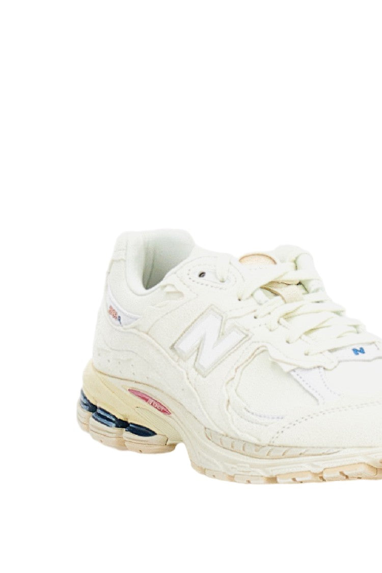 New Balance 2002R Protection Sneakers With Deconstructed Aesthetic