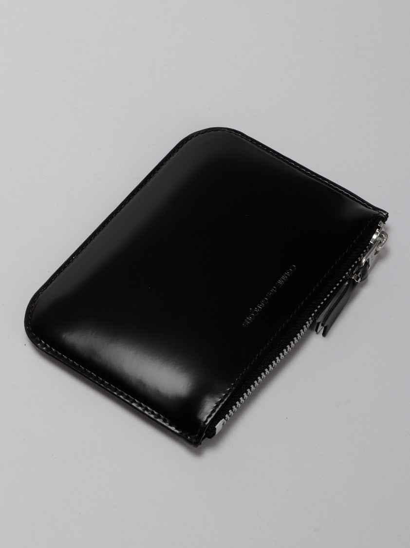 Comme Des Garçons Smooth Black Leather Zip Wallet With Silver Interior