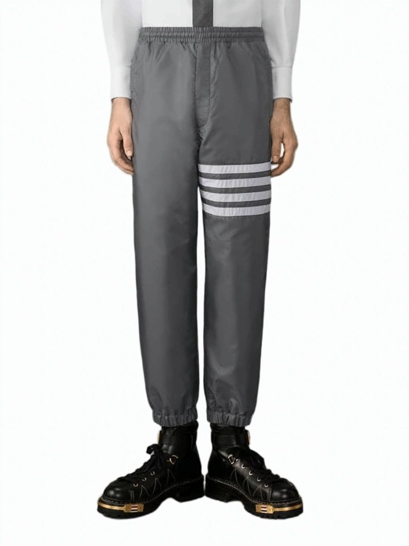 Thom Browne Shiny Ripstop Track Pants With Four Stripes