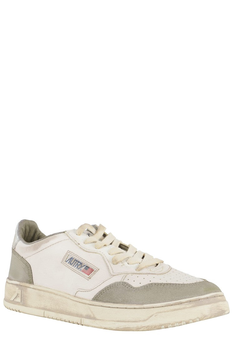 Autry Vintage Leather Sneakers With Pointed Toe And Signature Heel