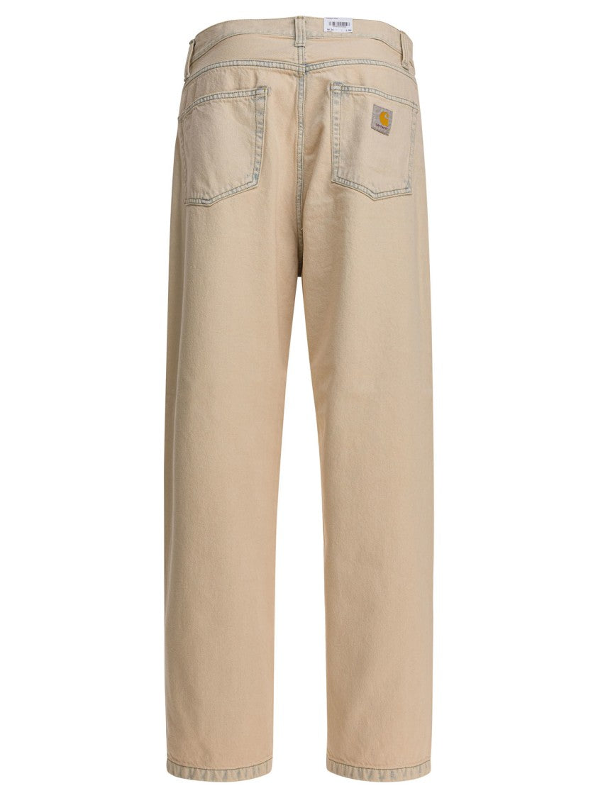 Carhartt Wip Wide-Fit Mid-Rise Jeans In Worn Beige